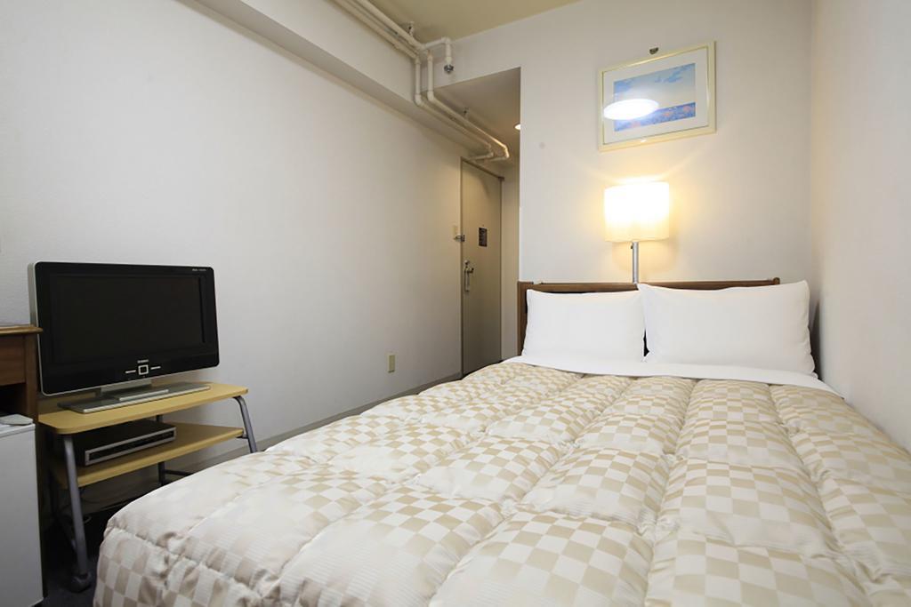 Shinjuku Urban Hotel Präfektur Tokio Zimmer foto
